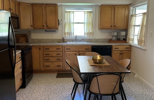 Long Green House | Bright & Modern 2BR Home with Sunroom and Outdoor Living
