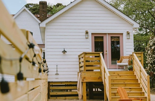 Southern Shores House | Canal front, Modern Tiny House! Bikes. Fire pit!