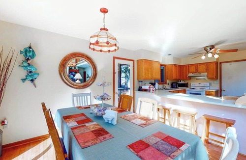 Ocean Pines House | Canalside Home in Ocean Pines with Large Deck, Canoes, Kayaks & Shared Pools