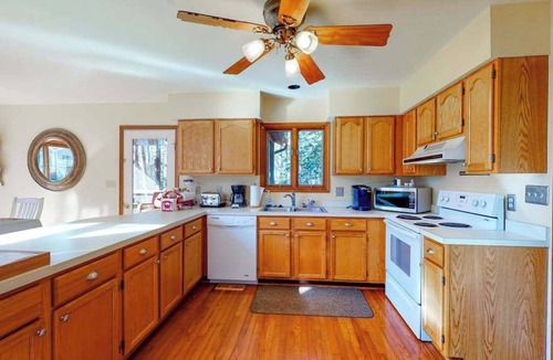 Ocean Pines House | Canalside Home in Ocean Pines with Large Deck, Canoes, Kayaks & Shared Pools