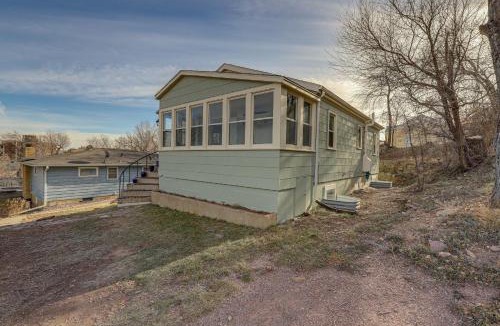 Rapid City House | Central Rapid City Home w/Sunroom & Fireplace!