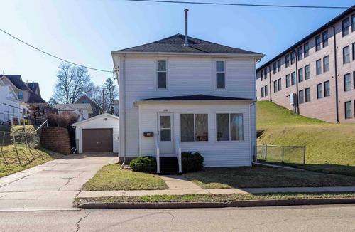 Dubuque House | Centrally located in family friendly neighborhood with off street parking.