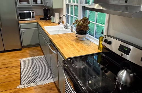 Bynum House | Charming 2-bedroom retreat nestled in the pines on a pond. 15 minutes from UNC