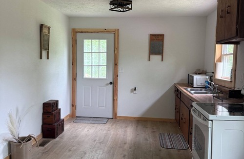 Elk Creek Other | Charming 3-bedroom farmhouse in tranquil Mountain Grove.