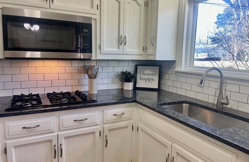 Overland Park House | Charming 3-bedroom house in peaceful Overland Park with garage and yard!