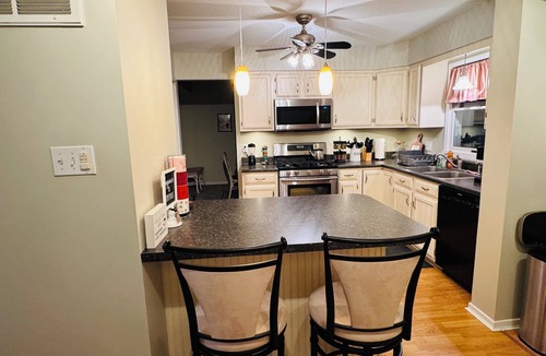 Dover House | Charming 4-bedroom house with pool and spacious backyard.