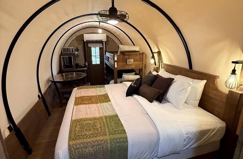 Pinnacles Entrance Badlands House | Charming Covered Glamping Wagons with Private Outdoor Spaces Near Wall Drug – Wall, South Dakota
