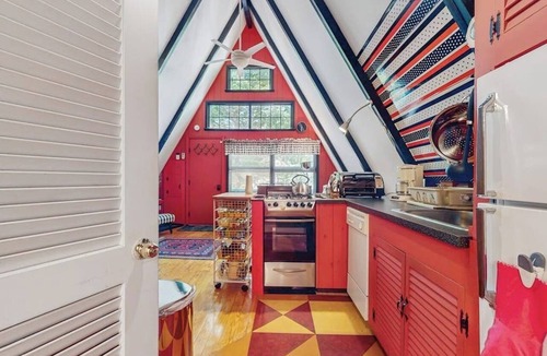 West Townshend House | Charming gingerbread A-frame situated on 3 acres, woodstove, A/C, deck