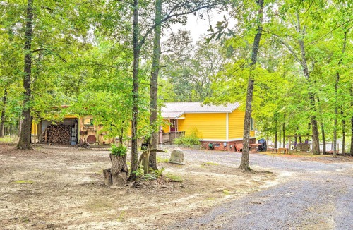South Carolina Lakes & Blackwater Rivers Cottage | Cheery Swansea Home on Calmont Pond w/Dock!