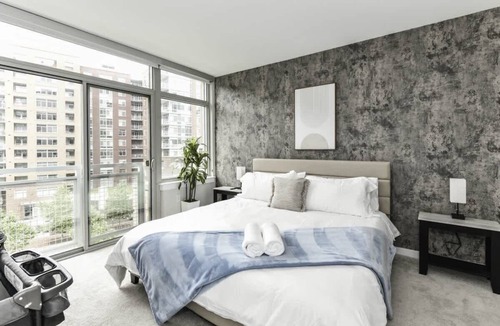 Crystal City Apartment | City View 2BR Retreat with Rooftop, Gym & Parking