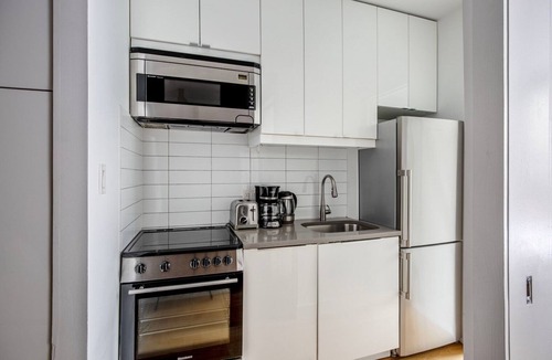 Bowery Apartment | Classic LES 1BR w/W/D, walk to SoHo & Nolita, by Blueground