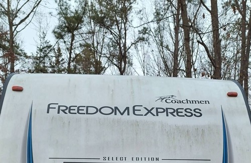 Clayton House | Coachman Freedom Express at the Cabin in the woods