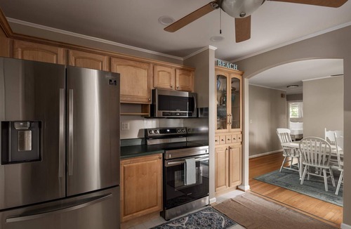 Colonial Beach House | Coastal Grace | Hot Tub, Game Room, & Fenced Yard