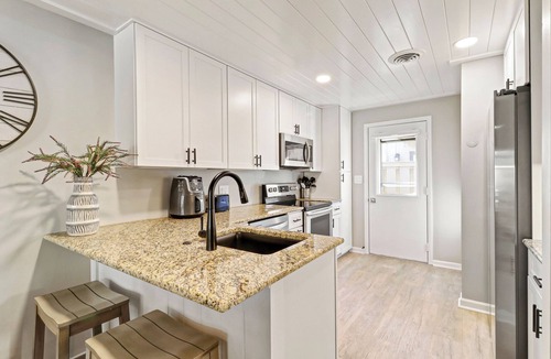 Palmetto Dunes Villa | Coastal Pet Friendly Villa with Private Deck and Community Pool Access