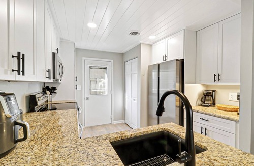 Palmetto Dunes Villa | Coastal Pet Friendly Villa with Private Deck and Community Pool Access