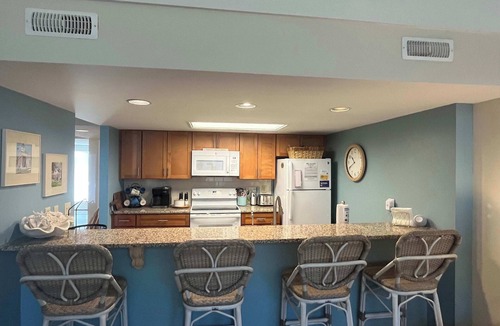 Ocean Ridge Condo | Coastal townhome with riverfront views, deck, & W/D - pool and athletic courts