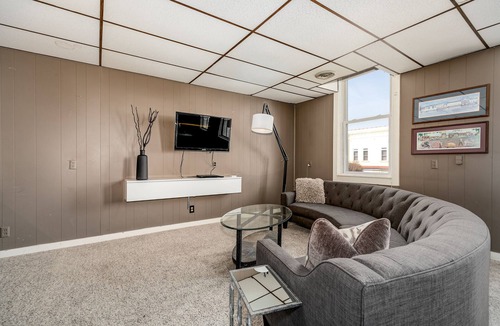Pella Apartment | Condo in Pella- Steps to Shops, Bakeries, and Iconic Windmill!
