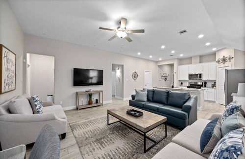 Conroe House | Conroe Single-Story 3BR Sleeps 12 | Fenced Yard, Garage Games, Workspace.