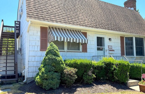 South End Cottage | Cozy 2-bdrm cottage 2nd floor in quiet south end Ocean City. AC, WiFi, big deck.