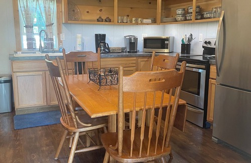 Bristow Cabin | Cozy cabin in a country setting with a private porch for relaxing and WiFi.