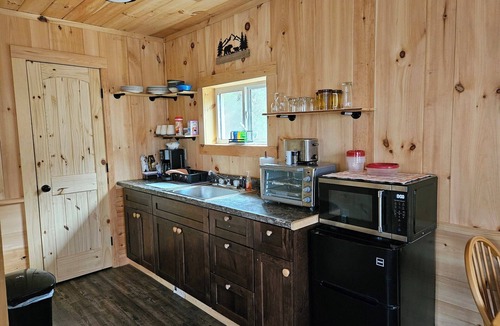 Butler Cabin | Cozy cabin in the woods on a beautiful Christmas Tree/Events Farm.