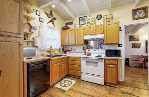 Silver Creek Village House | Cozy dog-friendly house near water with enclosed yard, grill, & equipped kitchen