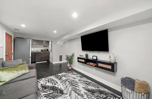 Irving Park Apartment | Cozy, Modern Garden Unit