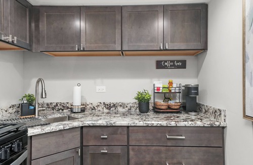 Irving Park Apartment | Cozy, Modern Garden Unit