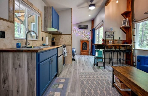 Boles Cabin | Cozy Tiny Cabin with Porch & Fire Pit near Scenic Trails in Western Arkansas
