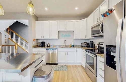 Ocean View House | Creekside townhouse with patio, grill & community pool - pet friendly