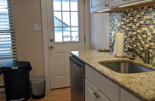 North Beach Haven Condo | Cute and cozy 2 bedroom Brant Beach condo across the street from the BEACH!
