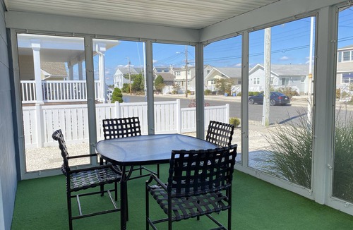 Avalon Cottage | Cute seashore cottage within walking distance to beach & shopping, screened porch