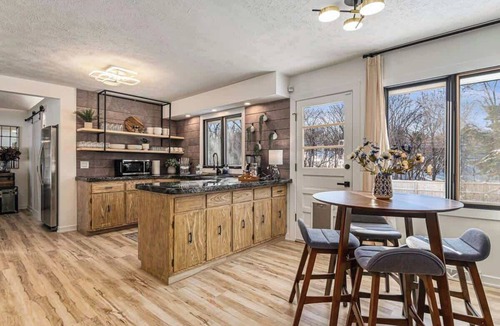 West Omaha House | Designer Home w/Private Yard, Theatre & Games!
