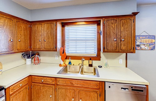 Tower Heights House | Dog-friendly home with large yard, grill, & basketball hoop