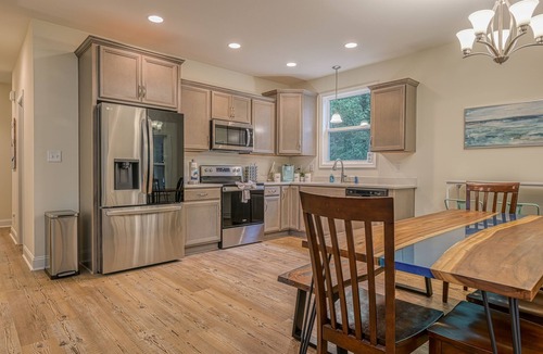 Mineral House | Dog-Friendly lakefront home with dock, game room, kayaks, hot tub, & firepit