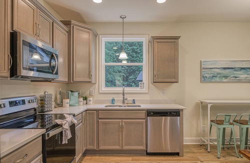 Mineral House | Dog-Friendly lakefront home with dock, game room, kayaks, hot tub, & firepit