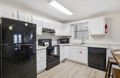 Caton Apartment | Dolly’s Darlings Duplex Units A & B by Beyond Expectations: Hot Tub & Game Room