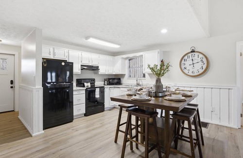 Caton Apartment | Dolly’s Darlings Duplex Units A & B by Beyond Expectations: Hot Tub & Game Room