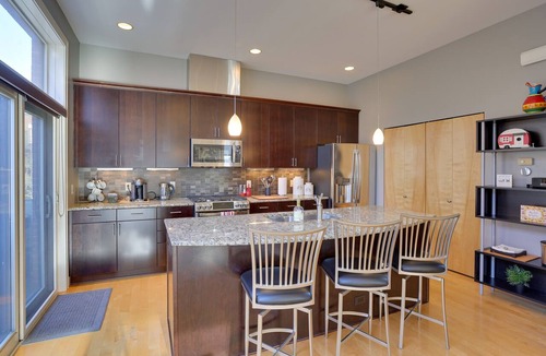 Southeast Omaha Condo | Downtown Condo w/Rooftop Patio & City Views!