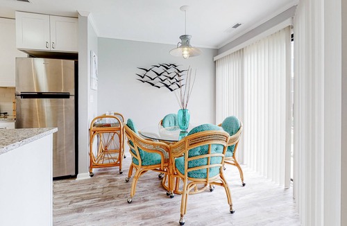 Fenwick Island Condo | East of the Sun condo with screened porch, fast WiFi, W/D, AC, and pool