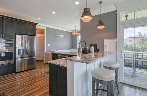 Livingston House | Elegant lakefront home with water access, hot tub, dock, rec room & fireplaces
