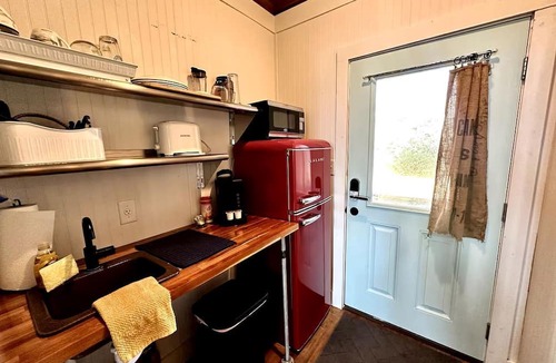 Kitty Hawk Cabin | Elevated Cabin in the Trees Perfect for a Weekend Getaway in the Outer Banks, North Carolina