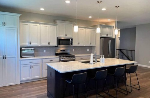 Bettendorf House | Entire Home: First Class Stay for Work & Play