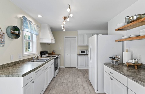 Milton House | Family and Dog Friendly Beach Retreat w/Pool Access, Fenced Yard, and Baby Gear
