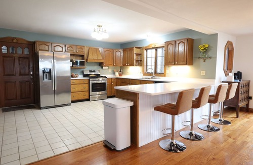 Stoughton House | Family-Friendly 5BR Lakefront Cabin Near Madison WI Sleeps the Whole Crew