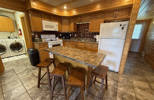 Yankton Resort | Family-friendly log cabin style house by Lewis & Clark Lake at DJ's Resort