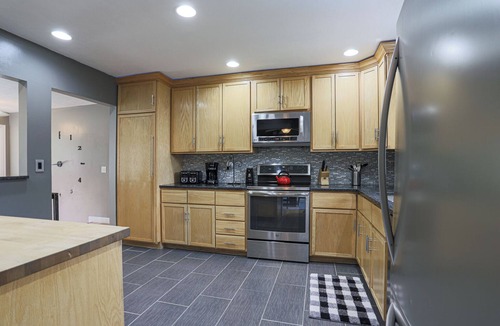 Omaha House | Family Fun Oasis: Pool, Hot Tub, Arcade & Ninja Course with 4 Bedrooms!