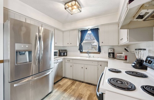 North Central Omaha House | Family-sized home with outdoor pool and deck