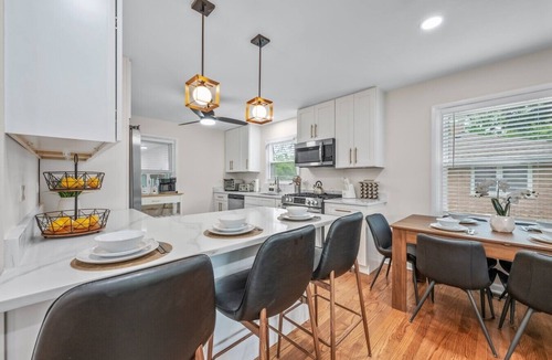 Russell House | Family Stay with Game Garage, Fire Pit, Streaming TVs and Private Yard