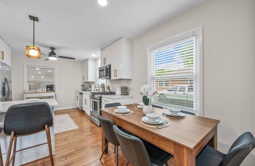 Russell House | Family Stay with Game Garage, Fire Pit, Streaming TVs and Private Yard